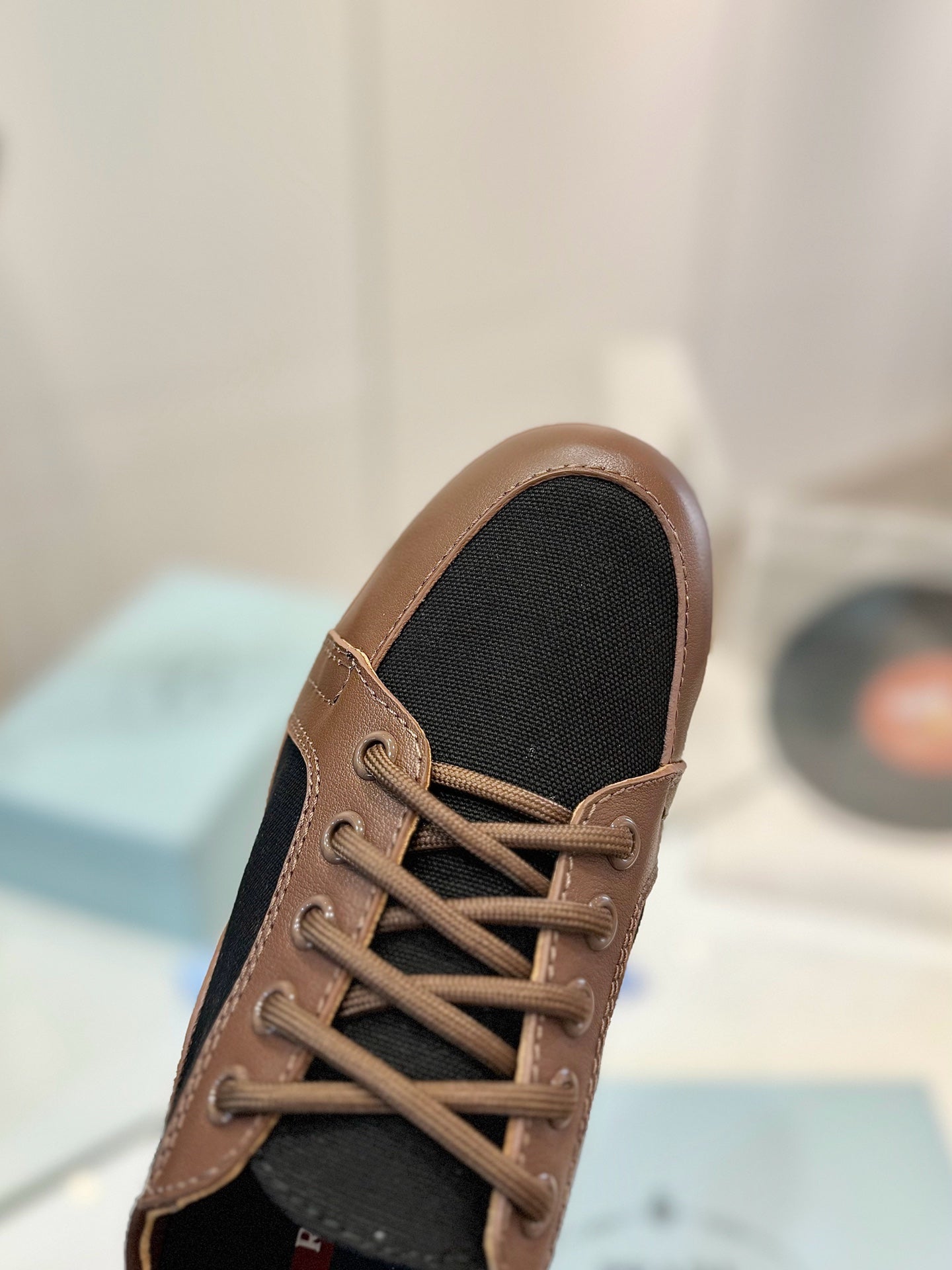 PRADA SNEAKERS IN BROWN LAMBSKIN AND BLACK CANVAS