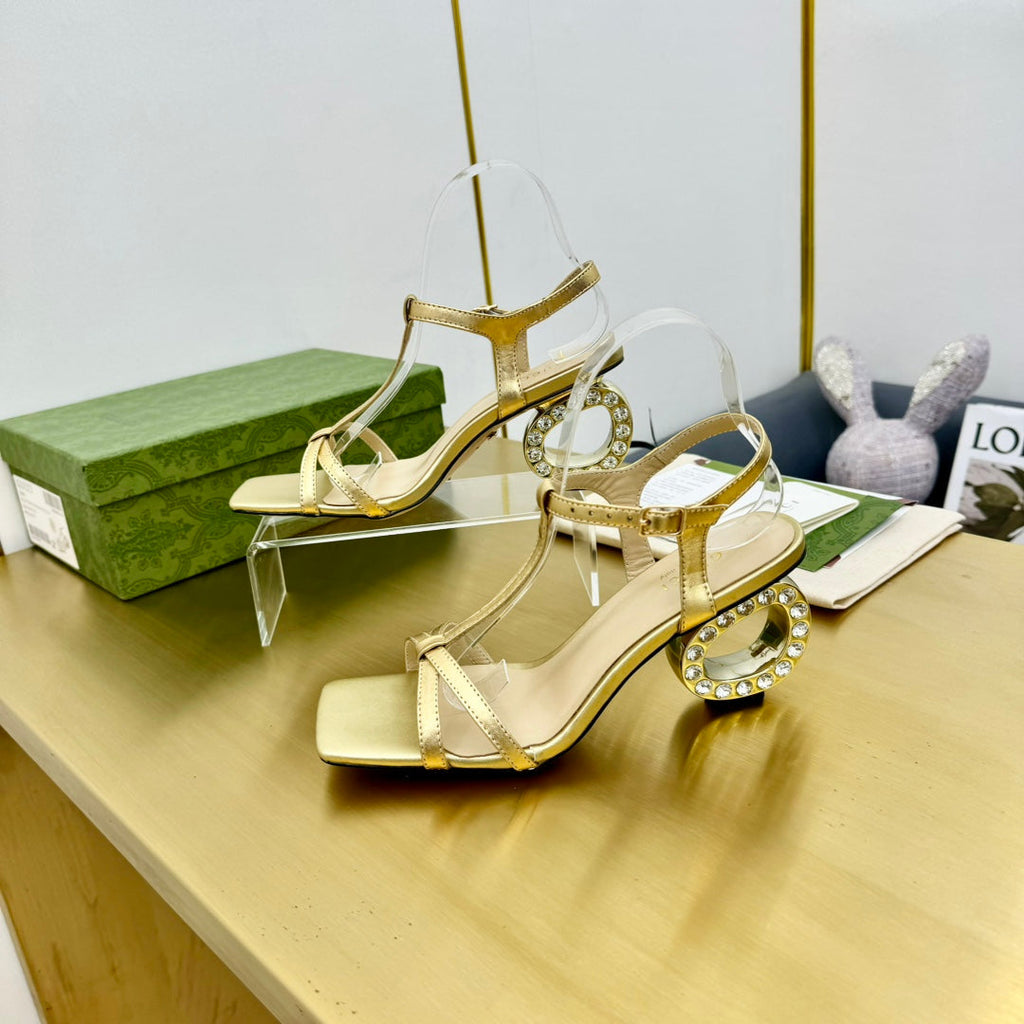 GUCCI MEDIUM-HEEL SANDAL IN GOLD CALFSKIN GOLD HARDWARE WITH RHINSTONES