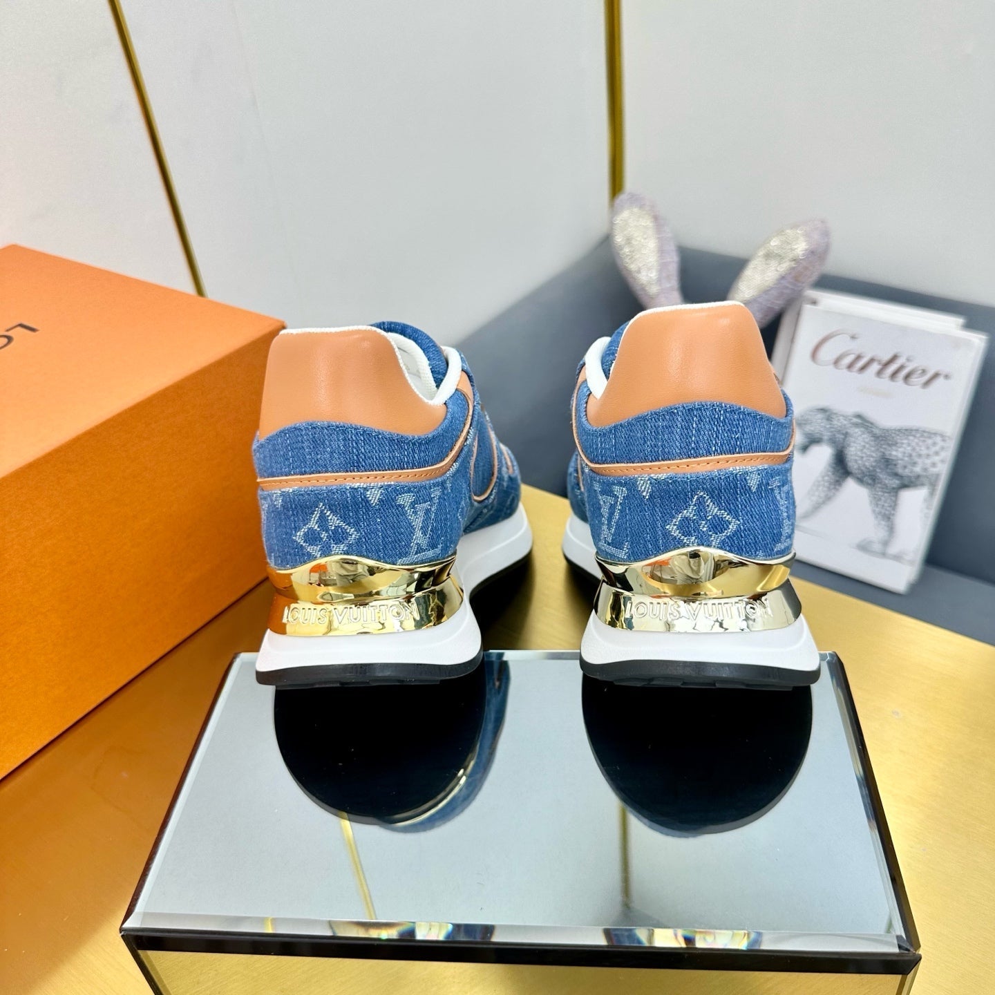 LOUIS VUITTON NEO RUN AWAY SNEAKER IN CLASSIC BLUE MONOGRAM DENIM AND ORANGE CALFSKIN