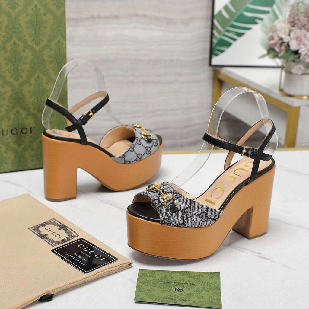 GUCCI HORSEBIT WEDGE SANDAL IN BLACK MONOGRAM JACQUARD FABRIC AND SHEEPSKIN LINING