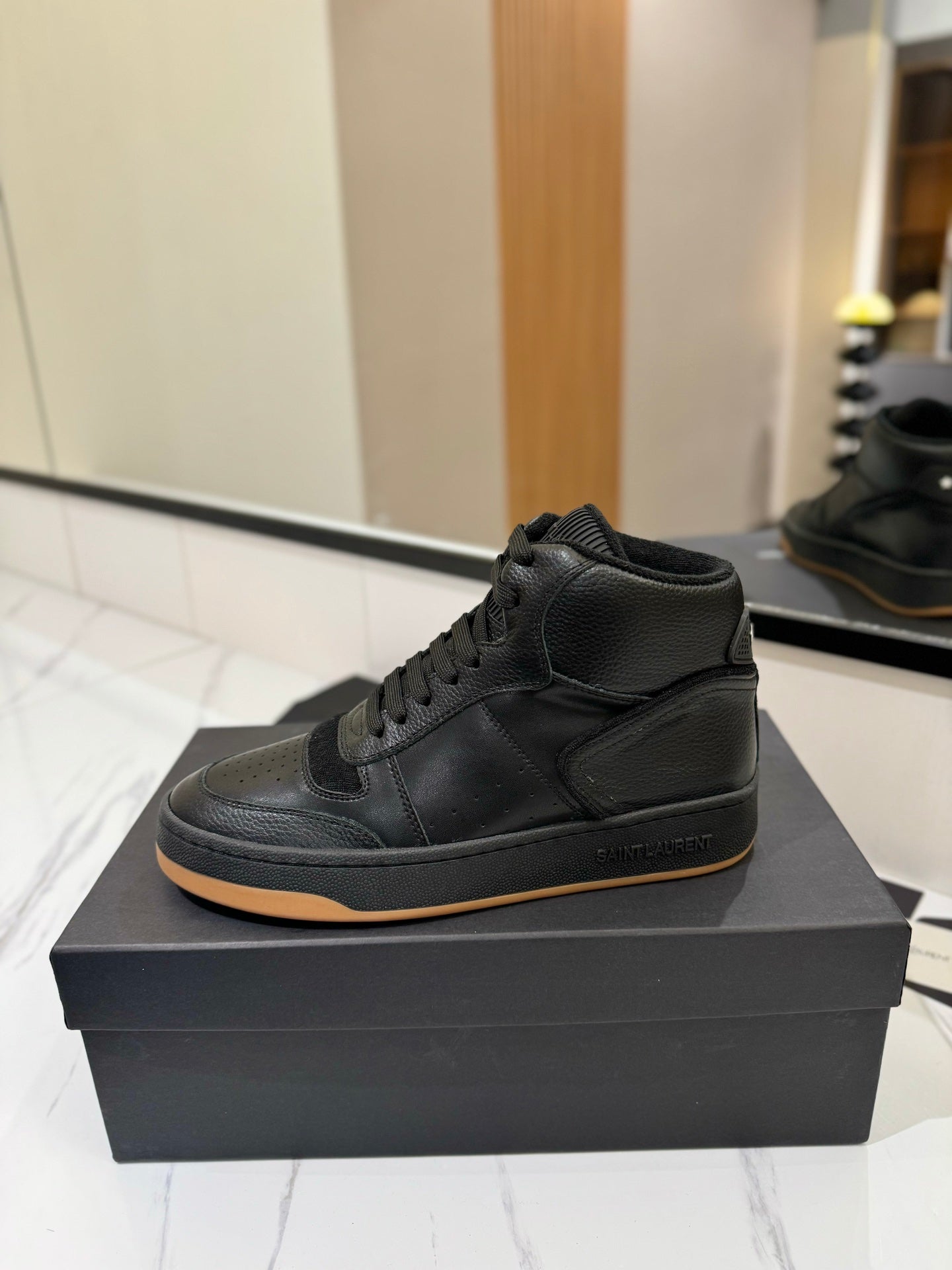 MID-TOP SNEAKERS IN BLACK PERFORATED LAMBSKIN