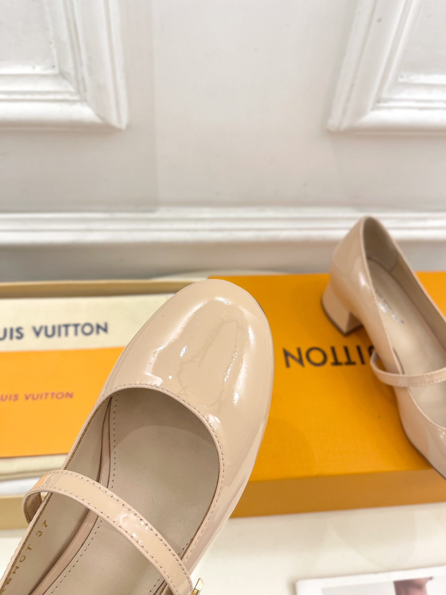 LOUIS VUITTON LV WOMEN ROMY HIGH BALLERINA IN GLOSSY BEIGE LAMBSKIN