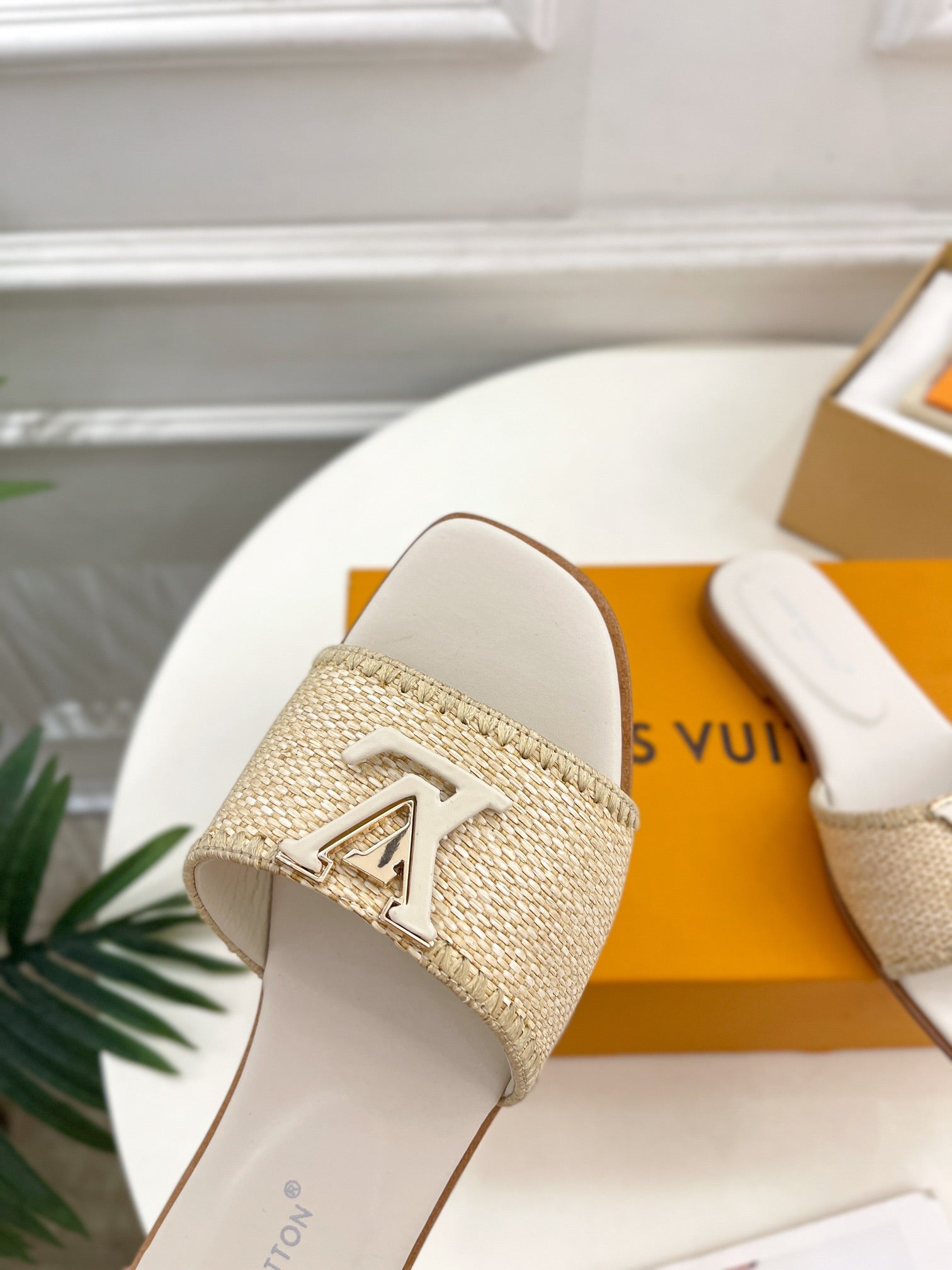 LOUIS VUITTON LV WOMEN CAPRI FLAT MULES IN BEIGE LEATHER AND RAFFIA