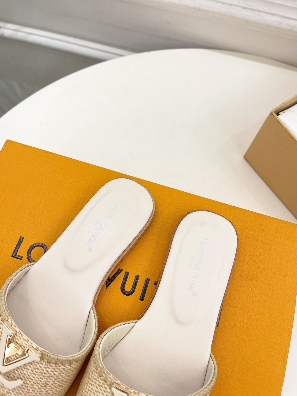 LOUIS VUITTON LV WOMEN CAPRI FLAT MULES IN BEIGE LEATHER AND RAFFIA