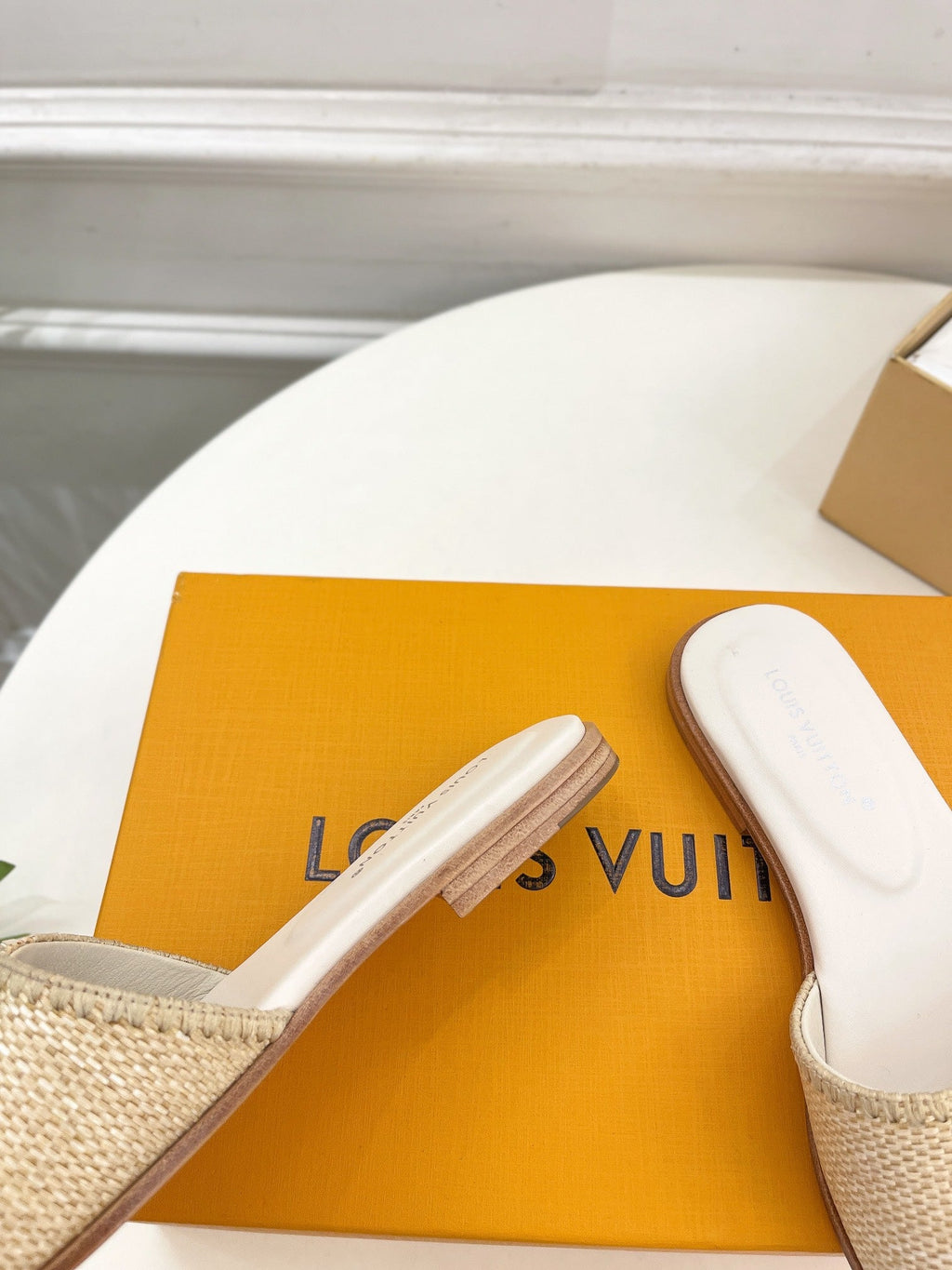 LOUIS VUITTON LV WOMEN CAPRI FLAT MULES IN BEIGE LEATHER AND RAFFIA