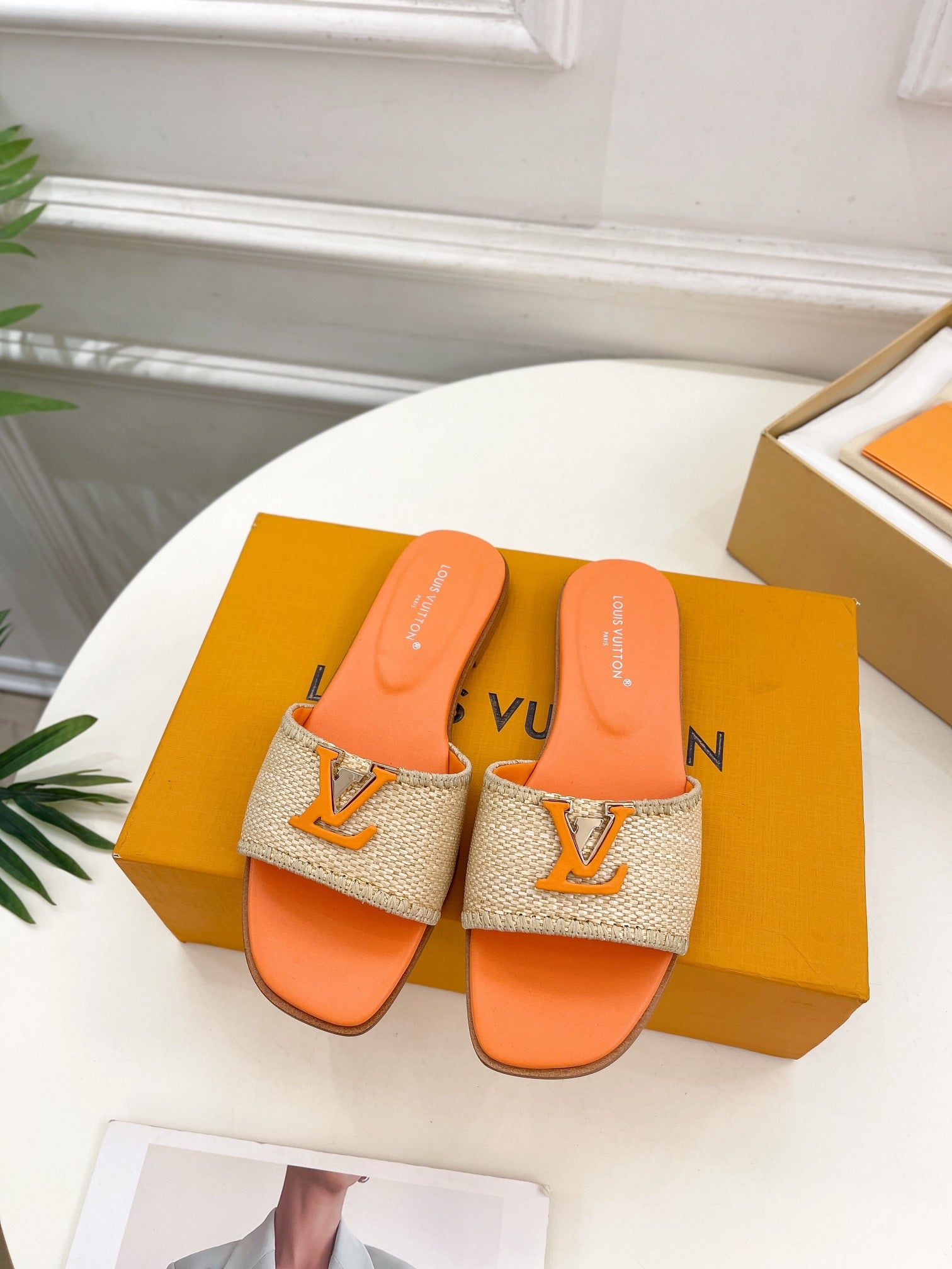LOUIS VUITTON LV WOMEN CAPRI FLAT MULES IN TIGER ORANGE LEATHER AND RAFFIA